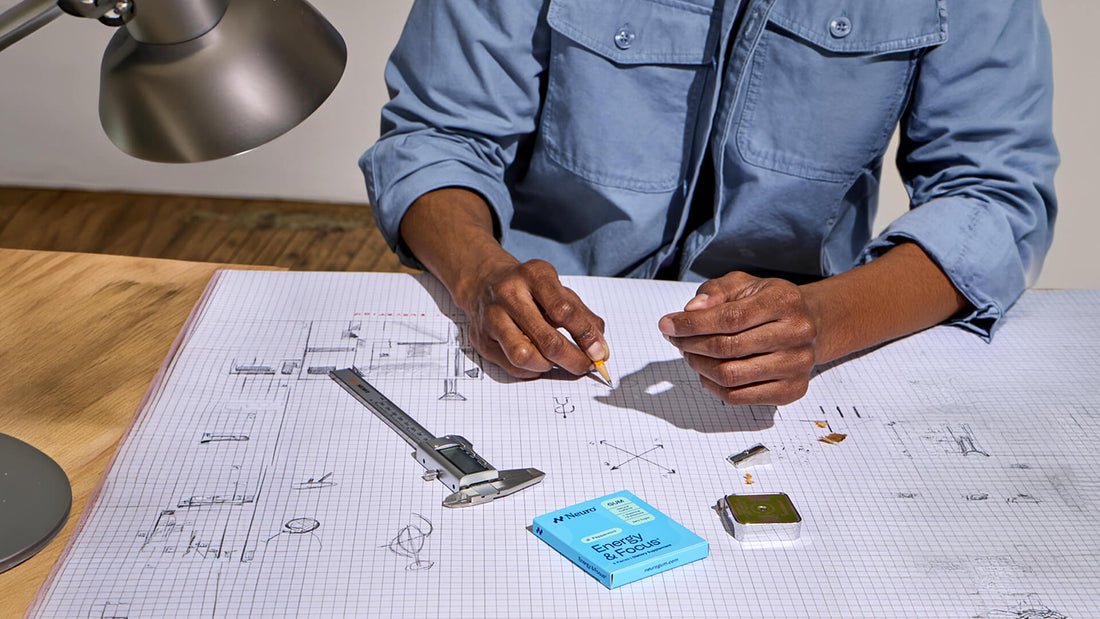 man working on a desk uses Neuro as nootropic